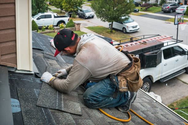 Professional Roof Replacement technician working in Beverly, OH